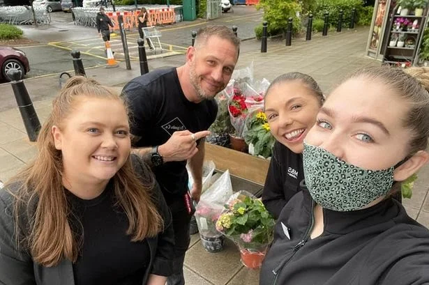 Tom Hardy with team members of Marks & Spencer. Photo: M&S Culverhouse Cross