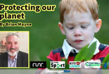 Brian Mayne. Background image by Adobe.
