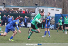 Danny Ryan shows a clean pair of heels on his way to score. Photo by Judith Dutton.