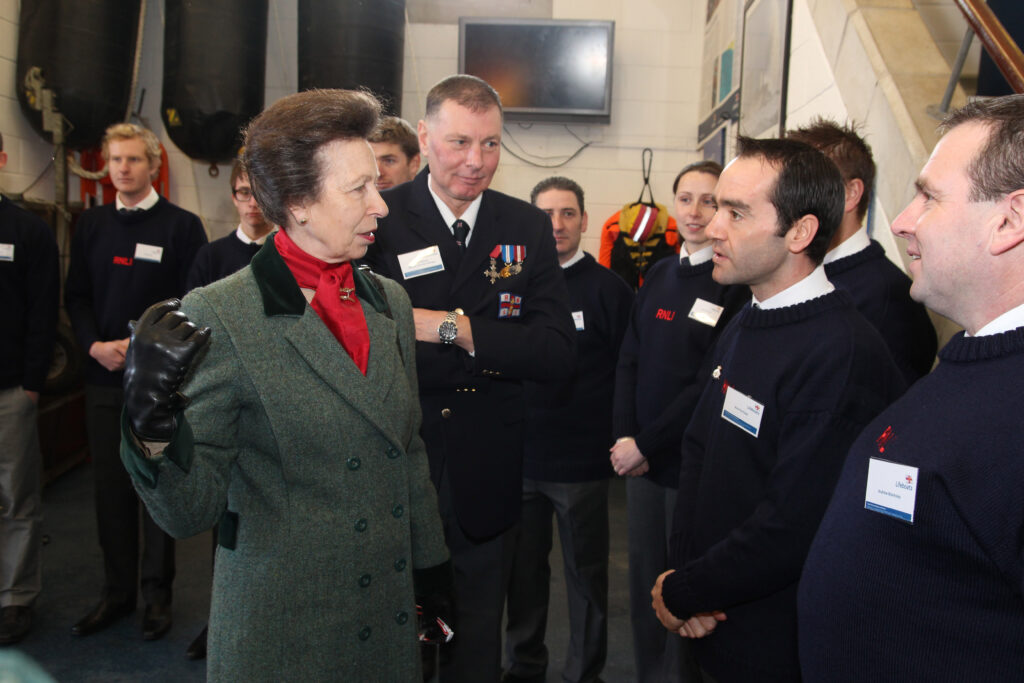 Philip introducing HRH Princess Anne to RNLI crew in Porthcawl in 2015. Photo by Porthcawl RNLI/Stephen Jones.