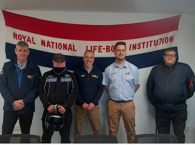 Jason (holding crash helmet) at the Barry RNLI presentation.