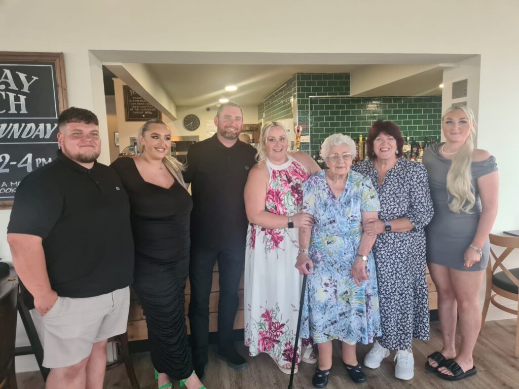 Glamorgan Star news - At the party are (left to right: Joe (Amy’s partner); Amy - Miriam’s great grand-daughter, expecting a baby boy in November;  Craig (Lucy’s husband); Lucy – granddaughter; Miriam; Julie (daughter) and Ella (youngest great grand-daughter) 