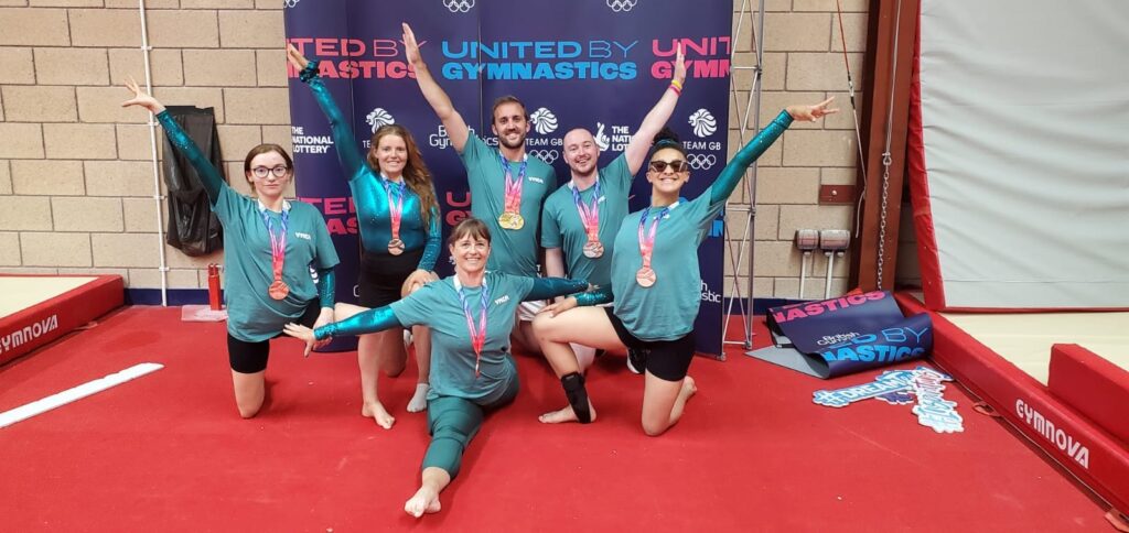 (Back row, left to right): Zoe Greenwood, Rosie Cumming, Jon Davies, Gareth Slocombe Thandiwe McDonnell. Front: Jacqui Bennett.