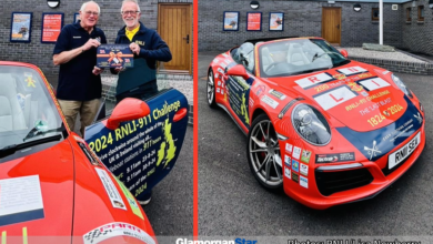 | James Richardson presenting a 200th Anniversary 911 Challenge jigsaw to Stuart McMillan, Chair of Barry Dock Lifeboat Station. Photo: RNLI/Lisa Newberry.