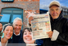 Larry Lamb reads his story in the local Glamorgan Star. Photo by Marco Zeraschi.