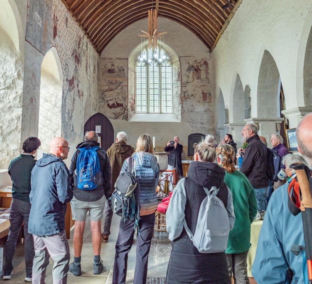 The pilgrim walkers in Llancarfan Church.