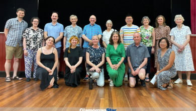 The choir pictured in rehearsal.