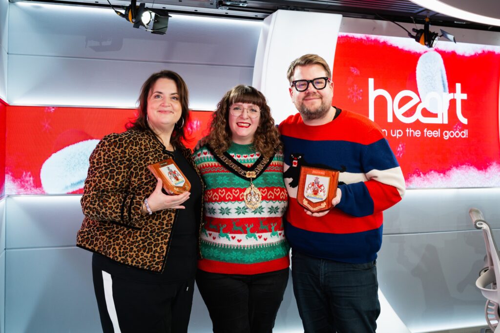 Cllr Catherine Iannucci-Williams presenting civic gifts to Ruth Jones and James Corden.
