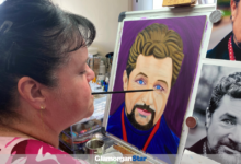Rosaleen working on her portrait of singer Michael Ball.