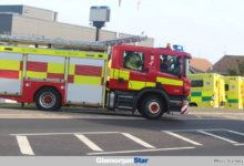 A fire appliance leaving Barry's fire station.