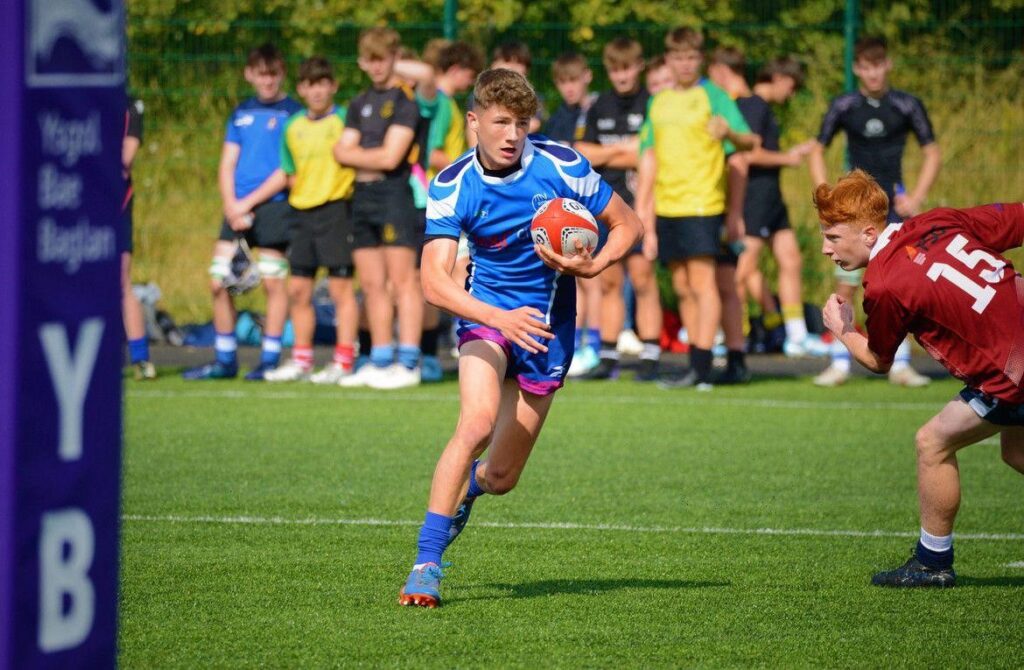 Aston on the rugby field.