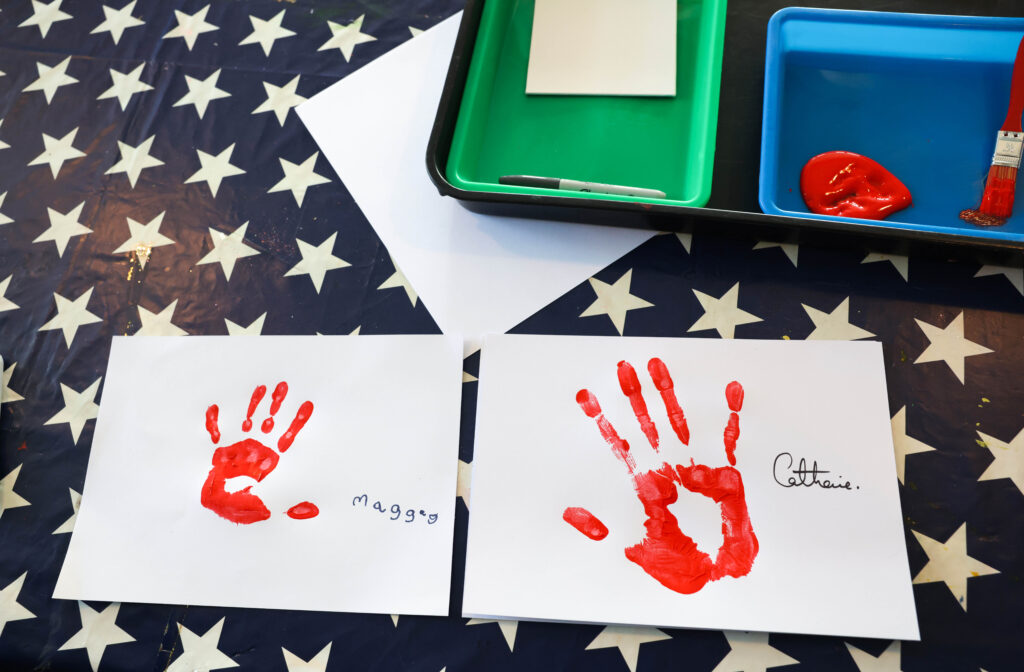 Side by side, Maggies and the Princess of Wales' red hand prints. Photo: Andrew Parsons / Kensington Palace.