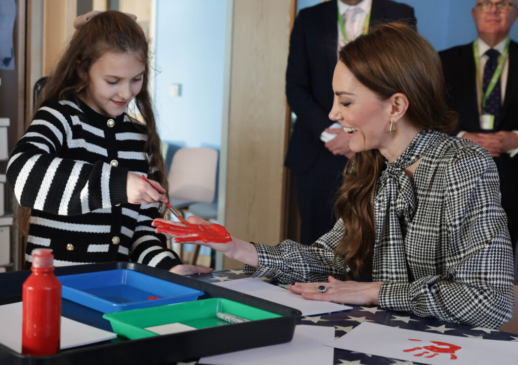 Nine-year-old Lottie painted the Princess' palm bright red. Photo: Andrew Parsons / Kensington Palace