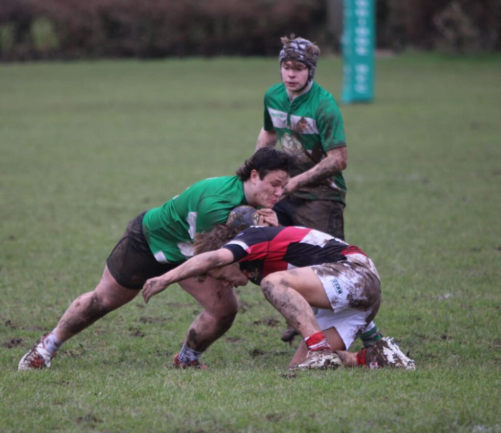 Rhys Nicholls meets stubborn resistance. Photo by Judith Dutton.