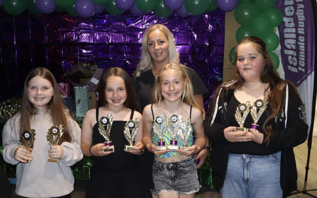 Under-11s award winners Amy Chew, Olivia Grace Williams-Canning, Paige Ryan and Ellie Gregory with coach Steph Williams-Canning. Photo: Judith Dutton.
