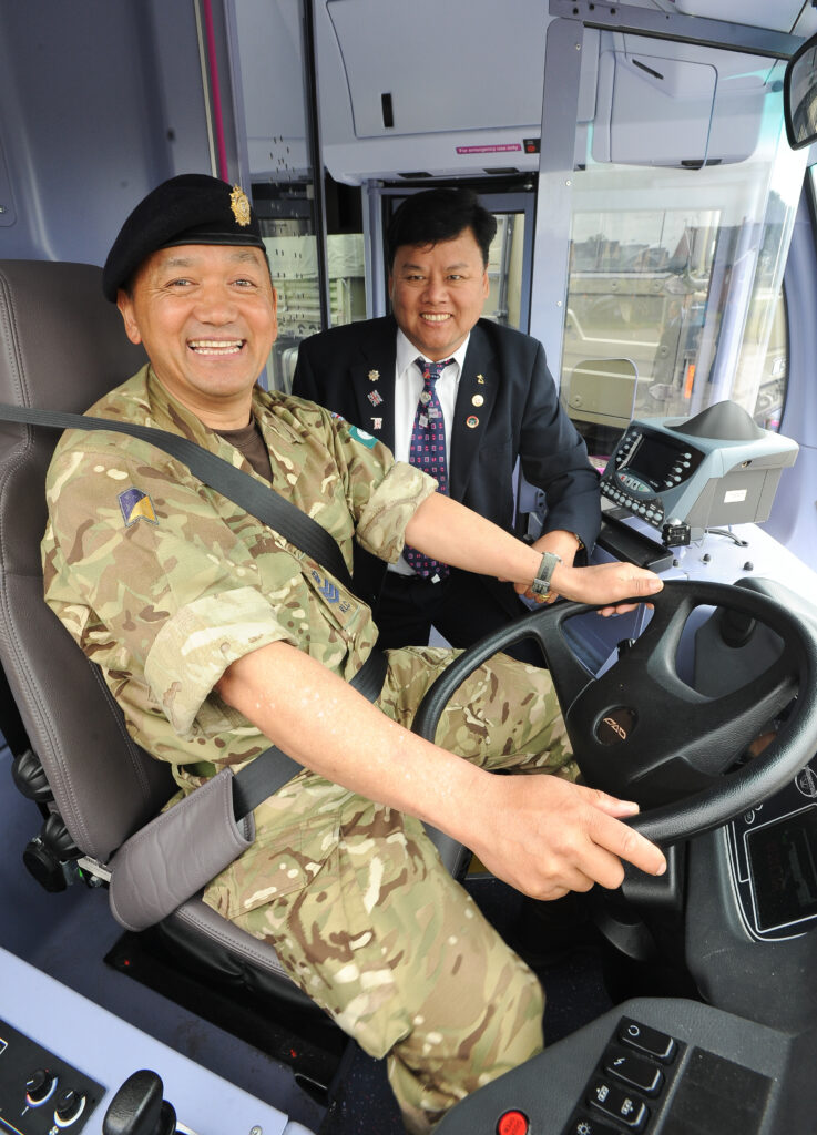 Bus company employees Kiran Gurung and Mitra Gurung in uniform. Photo: First Cymru