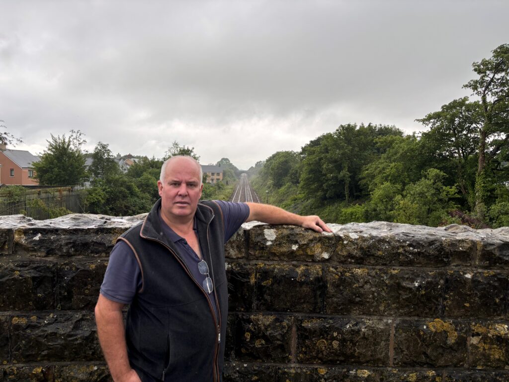 Andrew RT Davies on a Vale of Glamorgan railway bridge.