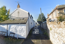 Plans to turn an old cottage, shown on the left, into three separate homes have been approved by Vale of Glamorgan Council. Photo: Google.