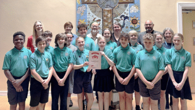 Pupils and staff with their Global Neighbours Cymru award