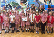Pupils from Saints Church in Wales Primary School in Barry with the Young Carers Award.