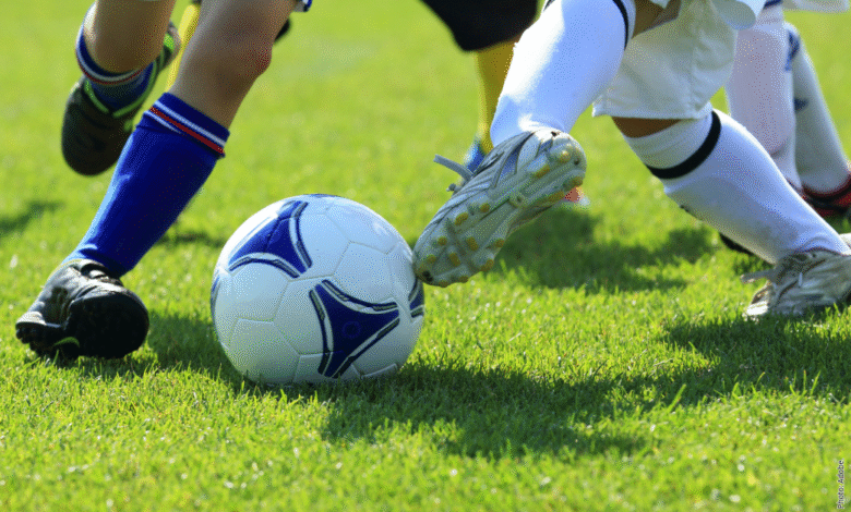 Football players. Photo: Adobe.