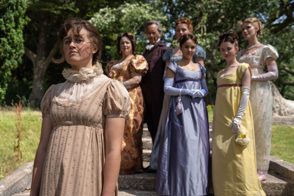 Ella Bruccoleri plays Mary Bennet with her fellow cast members of The The Other Bennet Sister in period costumes. Photo: Bad Wolf Productions.