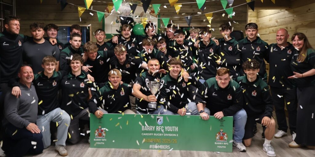 Barry Youth players, coaches and team manager with the league trophy. Photo by Campbell Prosser.