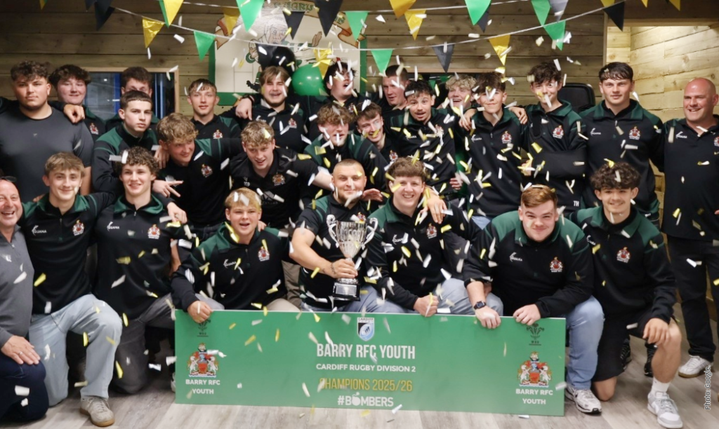 Barry Youth players, coaches and team manager with the league trophy. Photo by Campbell Prosser.