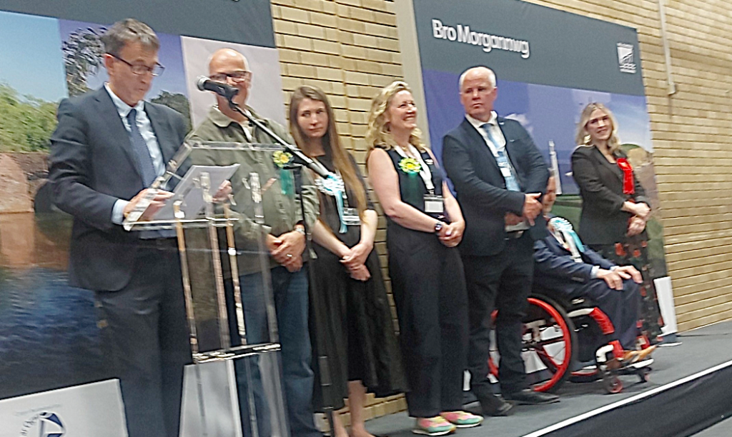 (Left to right): Returning officer Rob Thomas; Mark Hooper; Sarah Cooper- Lesadd; Sarah Rees; Andrew RT Davies; Gareth Thomas; Sarah Murphy.