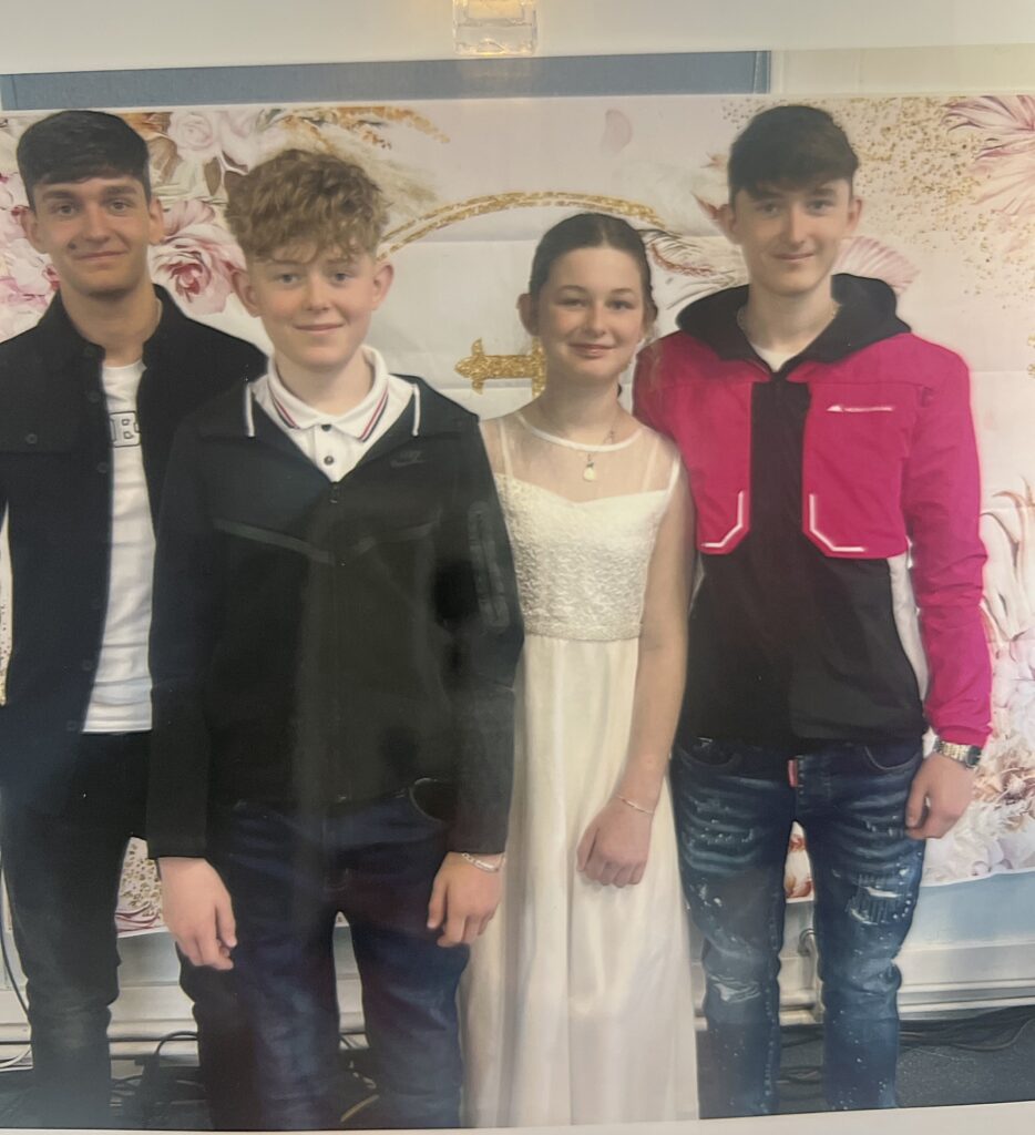 Alicia with her brothers Lloyd, Llewys and Llewellyn. Photo: Brain Tumour Research.