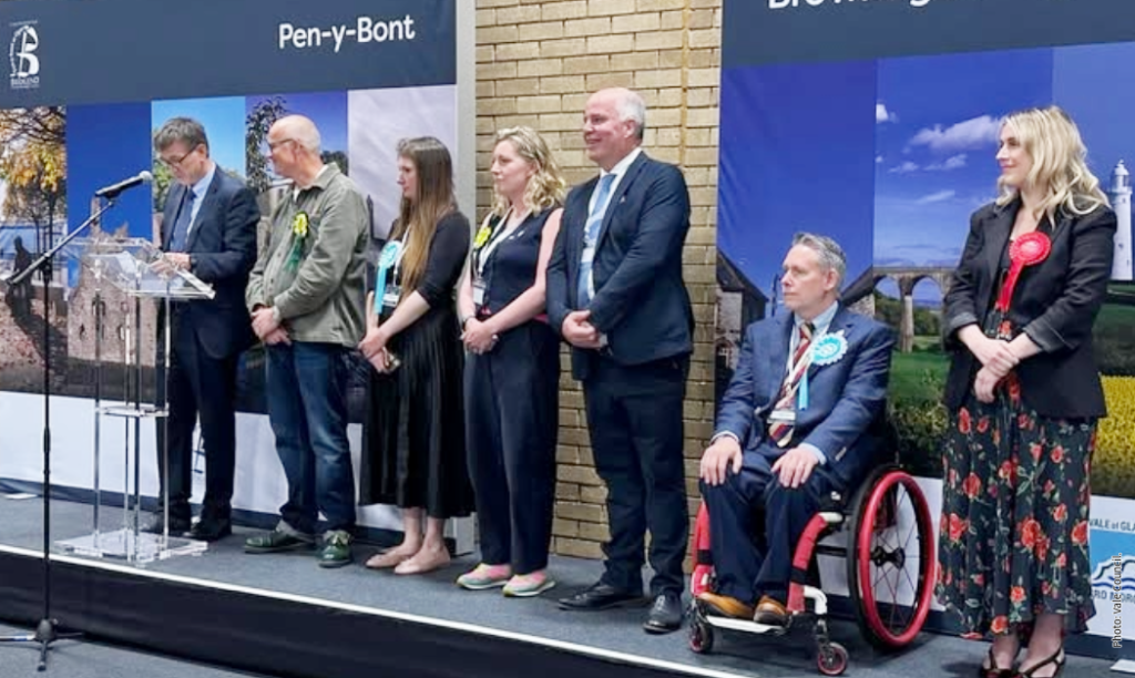 | Pictured left to right: Returning officer Rob Thomas; Mark Hooper; Sarah Cooper- Lesadd; Sarah Rees; Andrew RT Davies; Gareth Thomas; Sarah Murphy.