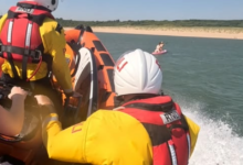 The crew check on a pair of paddleboarders. Photo: Porthcawl RNLI.
