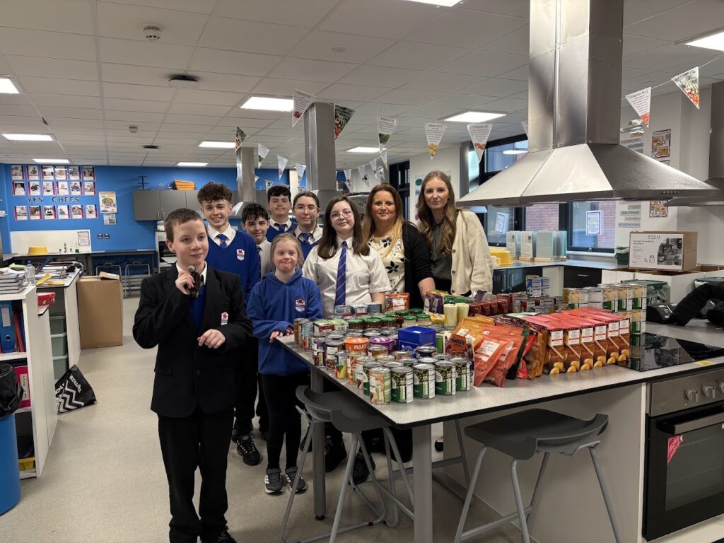 Some of the team with Foodbank donations.