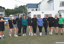 Trying social touch rugby at Pencoed RFC. Photo: Julie Hancock (https://juliehancock.org).