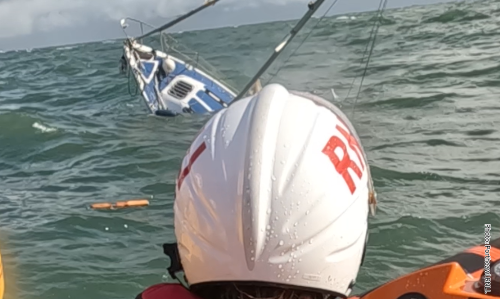 The yacht sinking on Scarweather Sands. Photo: Porthcawl RNLI.